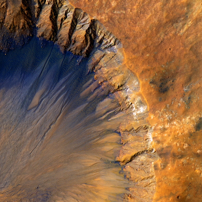 Abstract crater with blue and orange colours