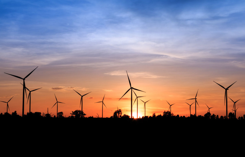 Wind farm silhouette at sunset