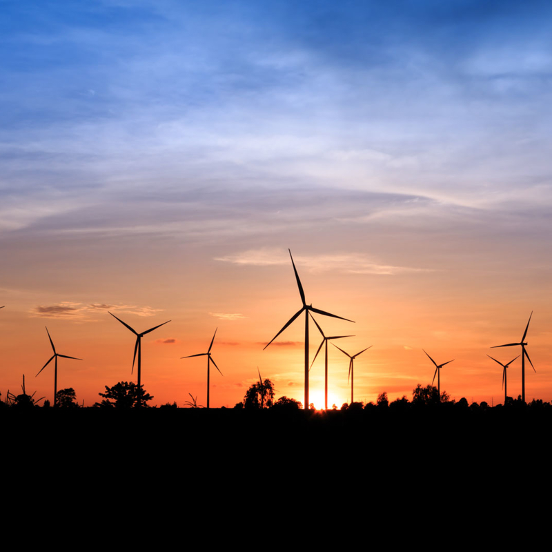 Wind farm silhouette at sunset