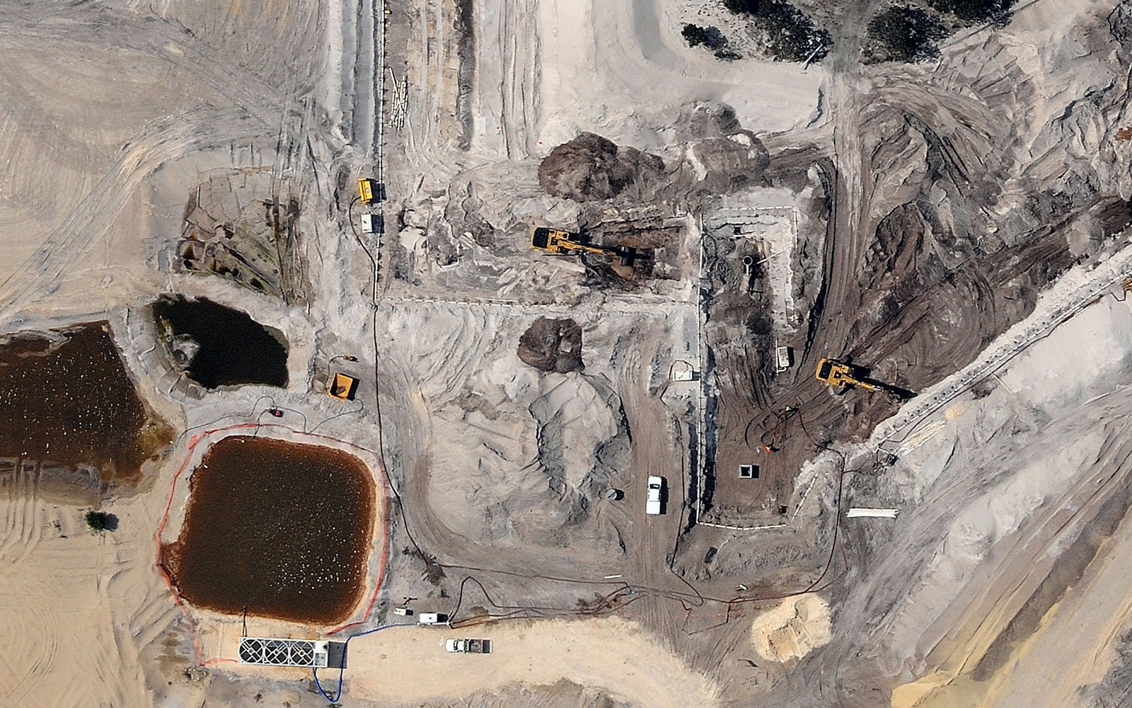 Aerial view of a development site with groundwater and soil treatment underway - location and date unknown