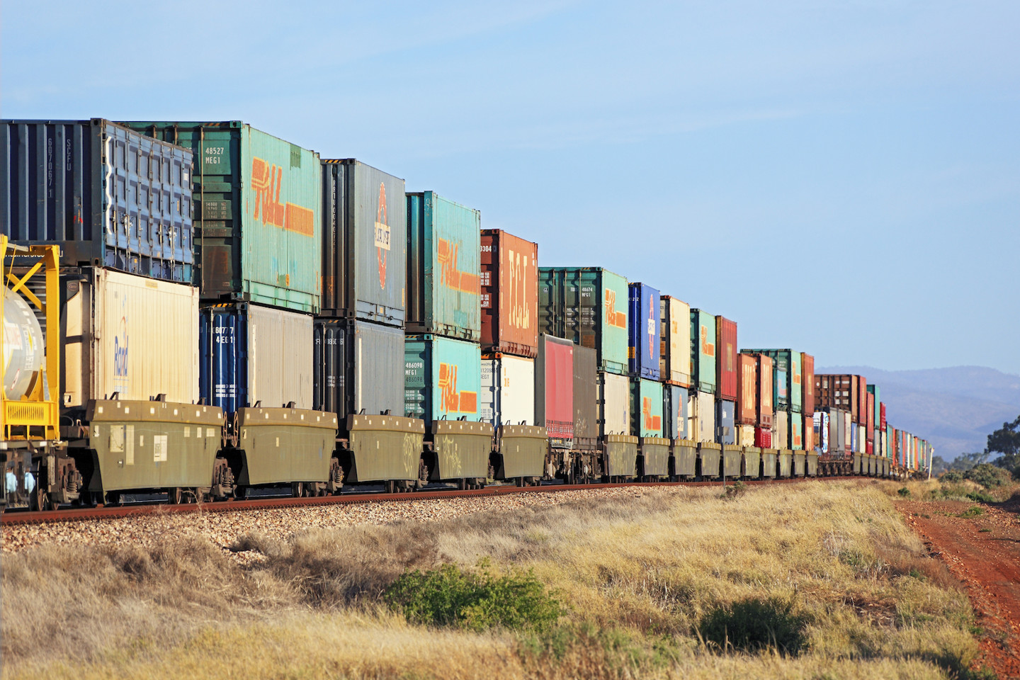 Inland Rail train carrying multiple shipping containers, Australia