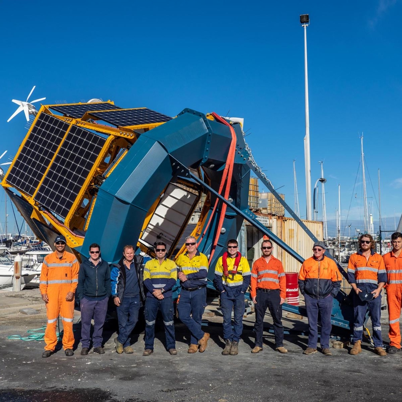 RPS Floating LiDAR buoy and members of the metocean team