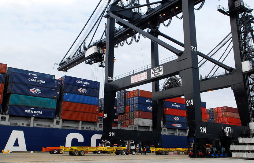The port of Houston, showing containers being loaded on a cargo ship