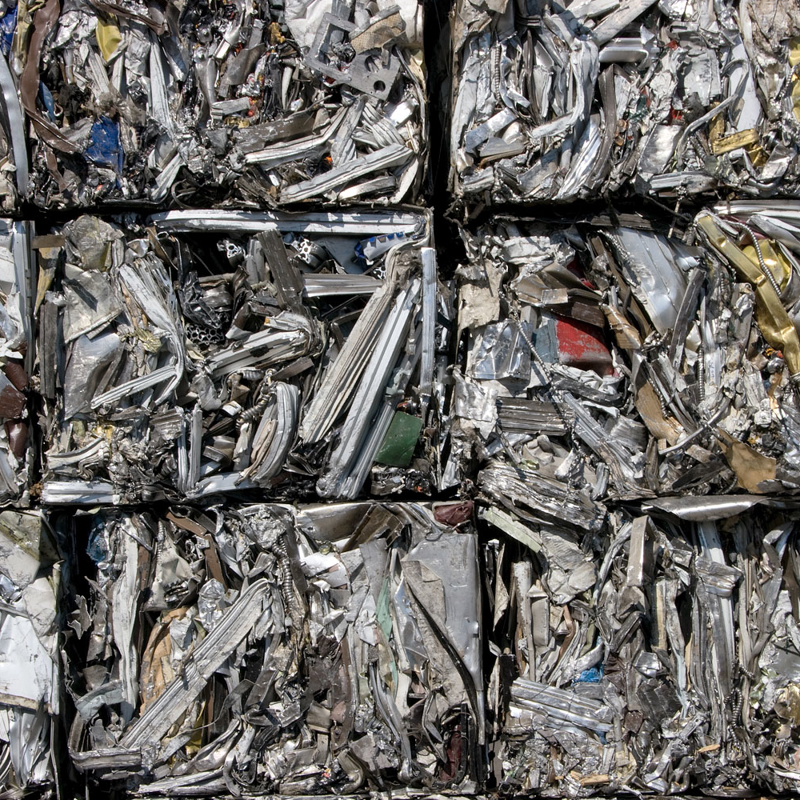 Scrap metal crushed into cubes for recycling