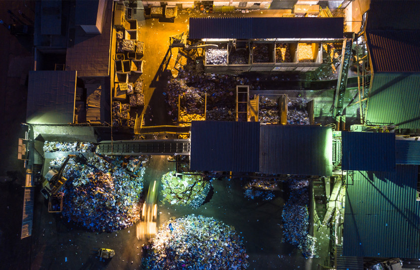 Aerial Shot of Recycling Centre Lit Up at Night