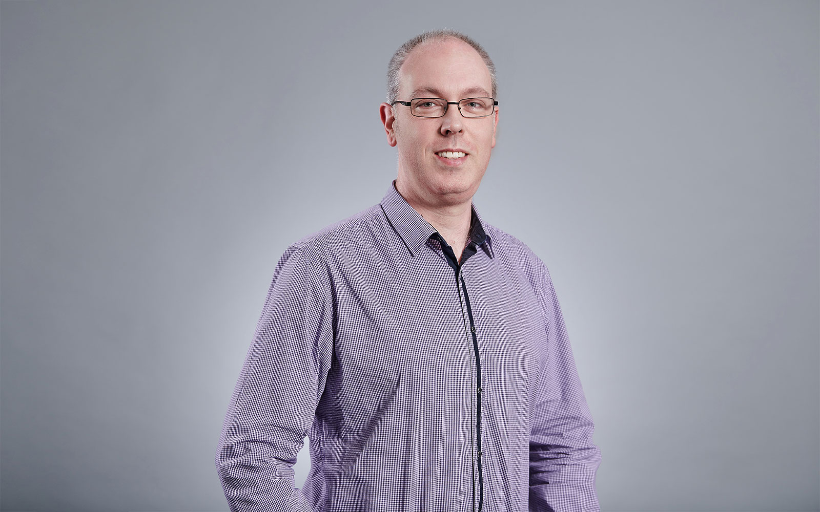 David Wright, RPS Practice Leader - Ocean Science & Technology.
Corporate headshot - David smiles at the camera wearing light purple check shirt.