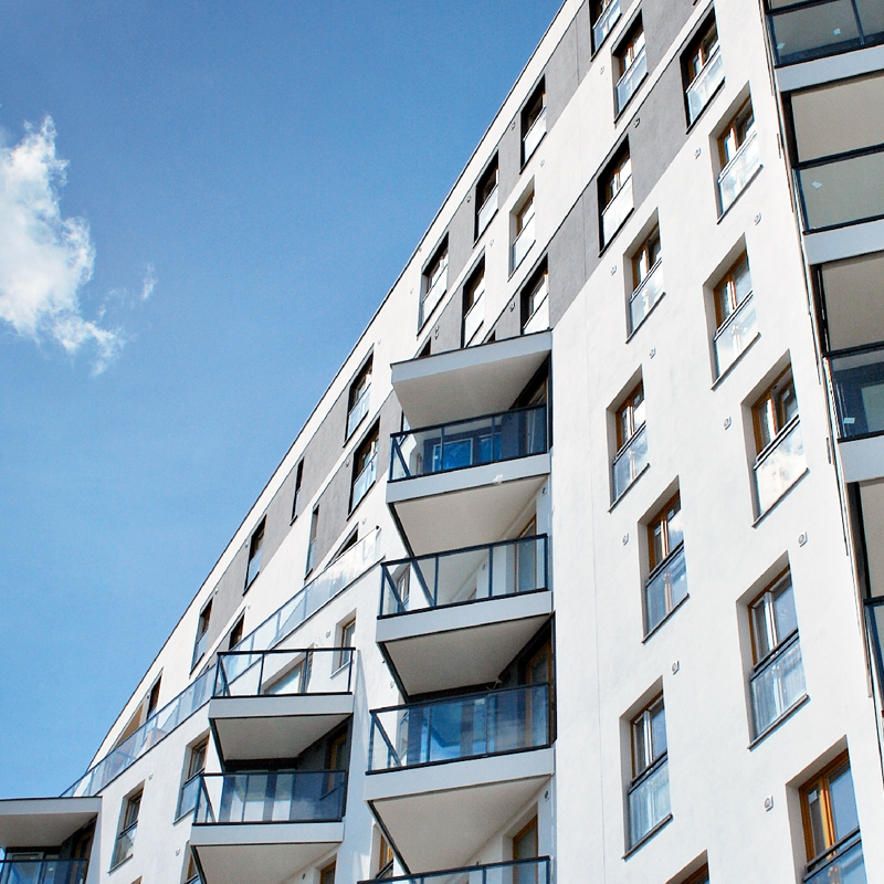 Modern high-rise apartment block and blue sky
