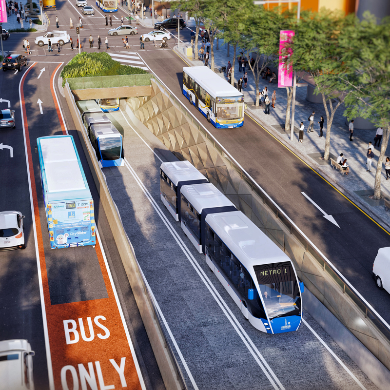 Mock up of what Brisbane Metro will look like once complete showing metro tram in conjunction with inner city buses, vehicles and pedestrians.