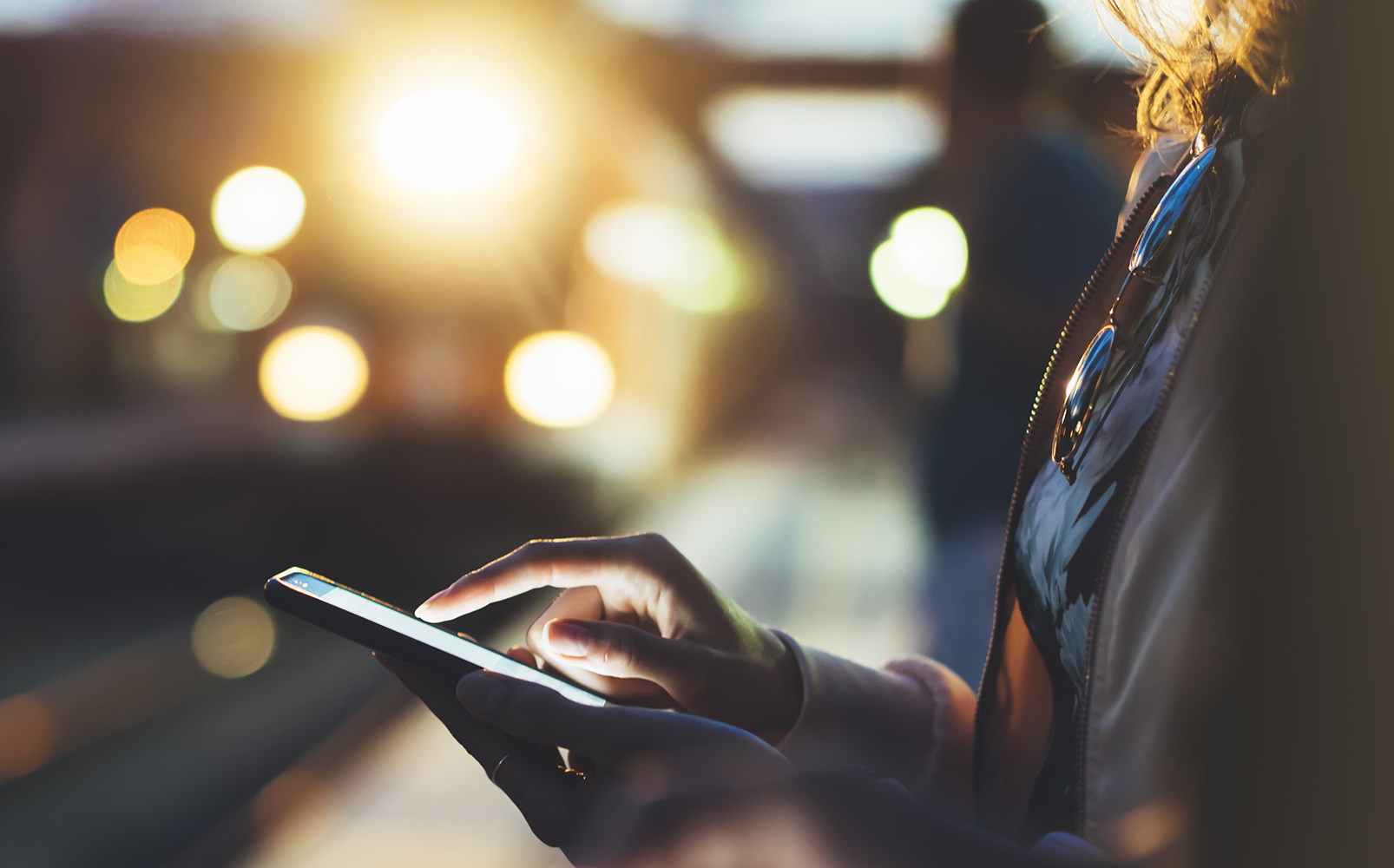 Woman using an ipad with her finger