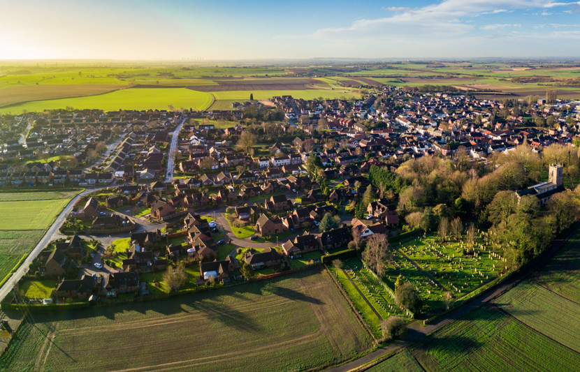 Residential homes surrounded by fields