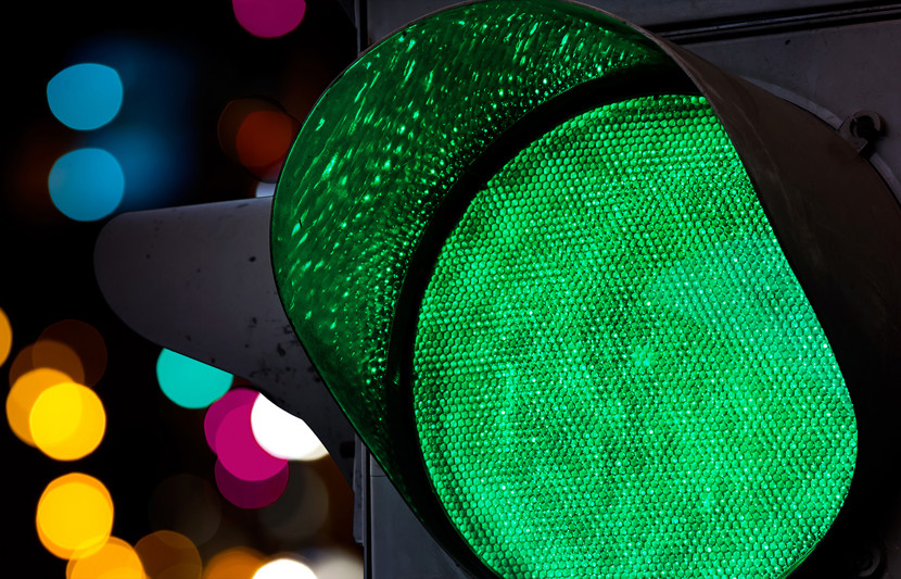 Green traffic light representing fast tracked infrastructure