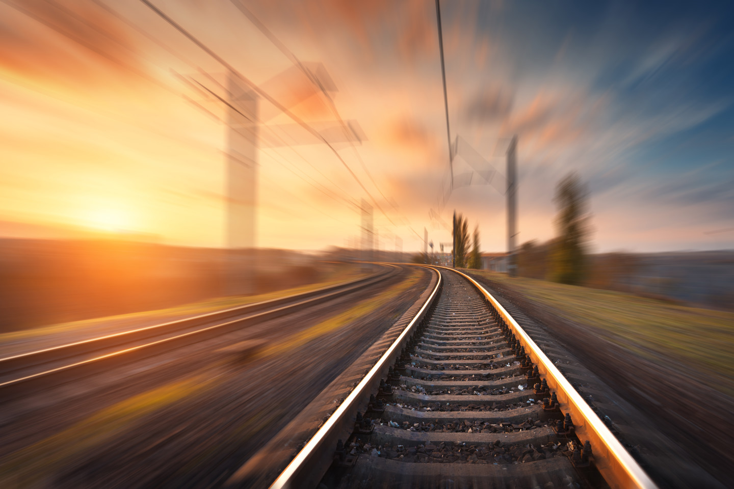 Fast tracked infrastructure shown through blurred rail line