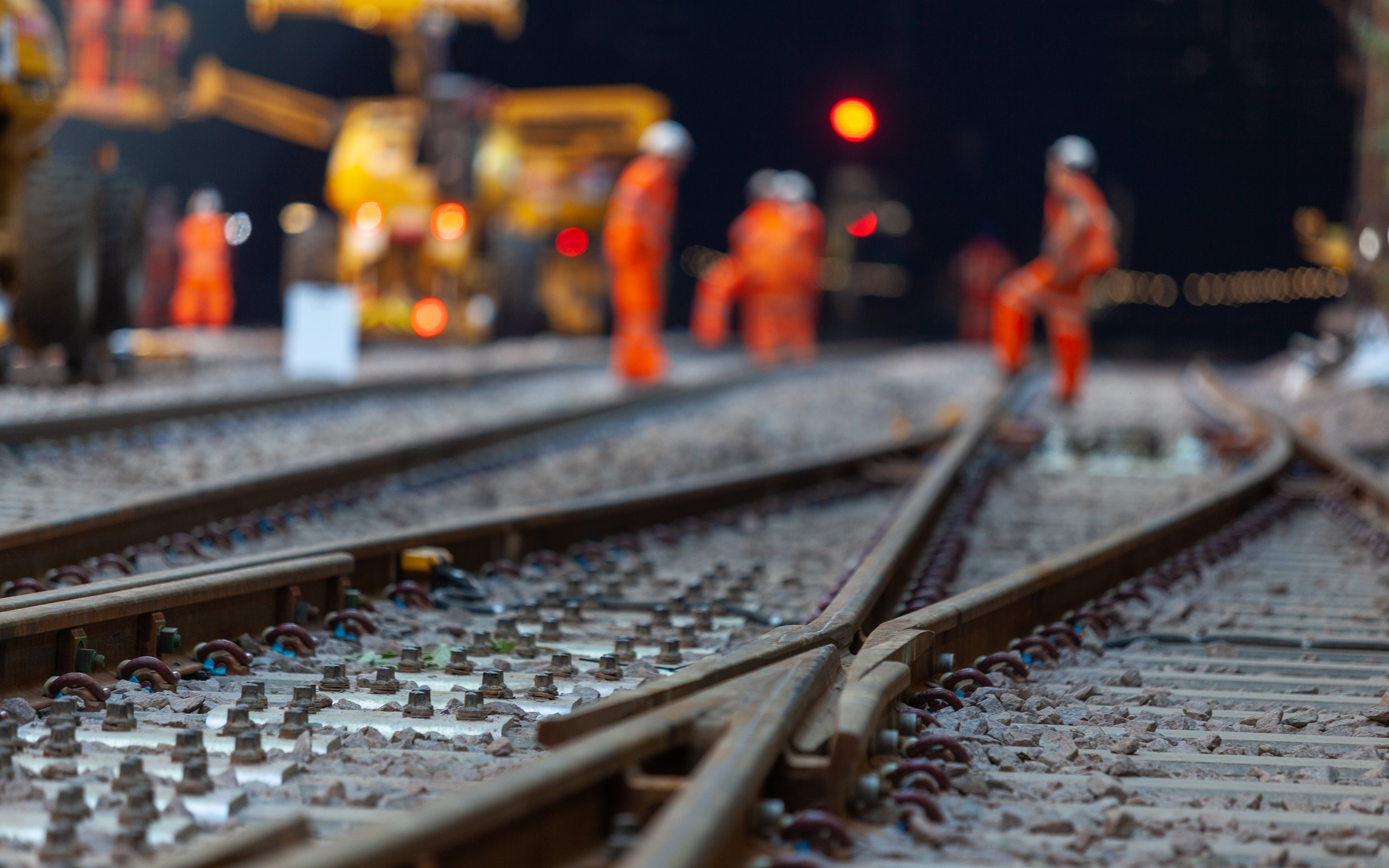 Workers at rail construction site