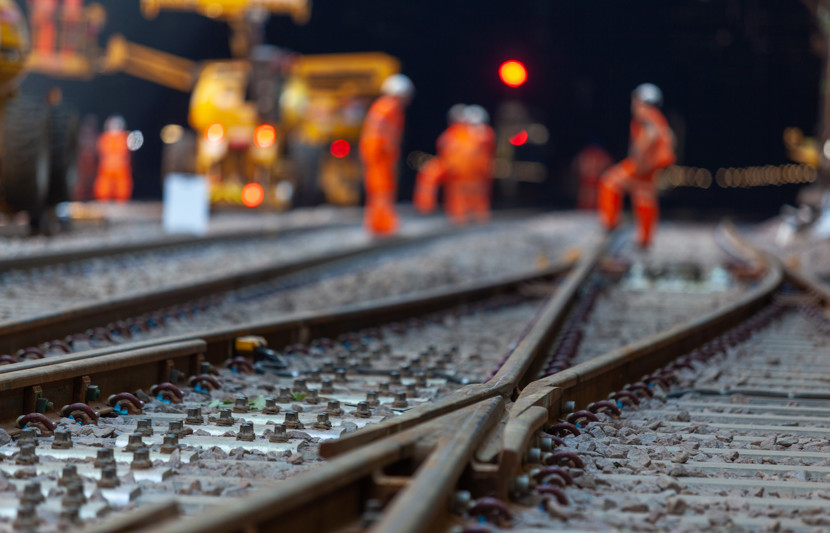 Workers at rail construction site