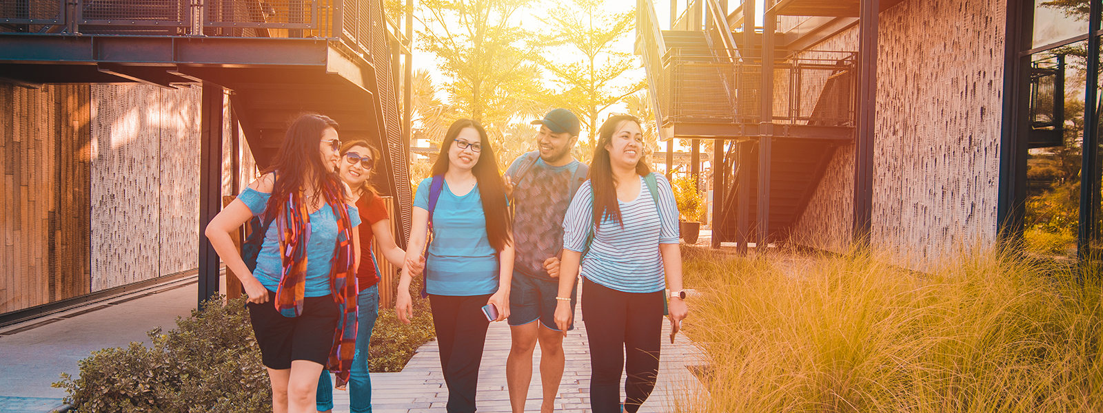Family walking through residential area.