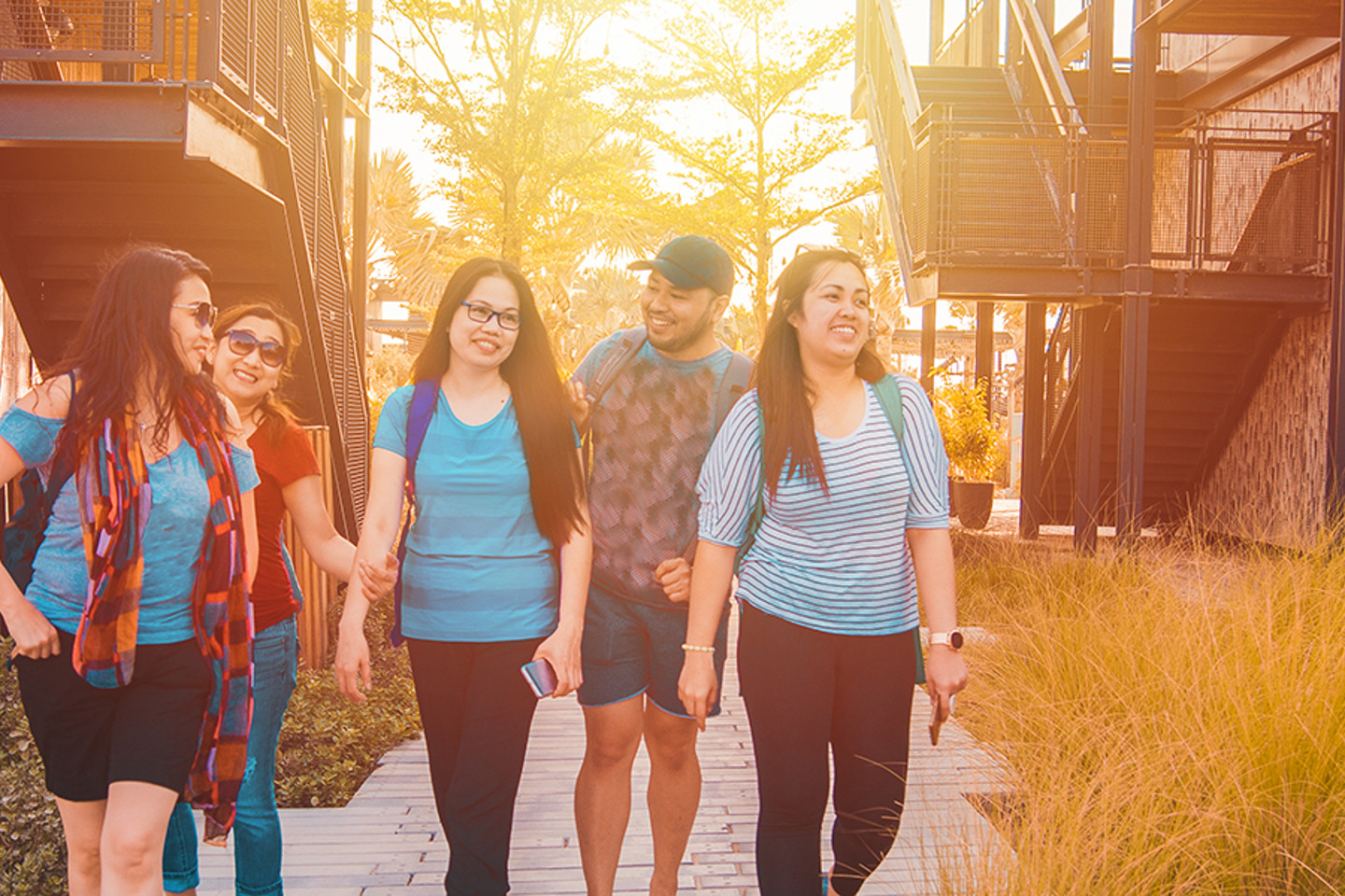 Family walking through residential area.