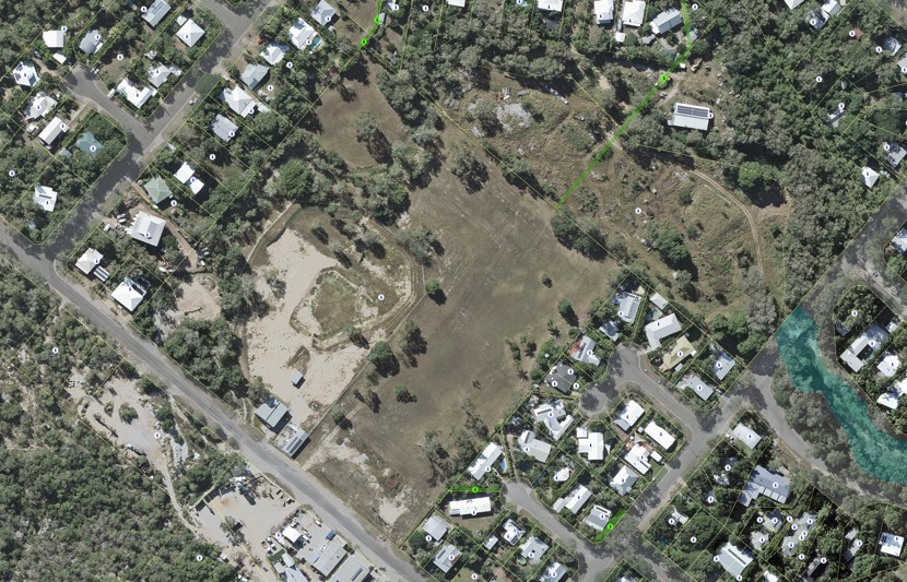 Aerial shot of Kelly Street Industrial Precinct green space and house tops