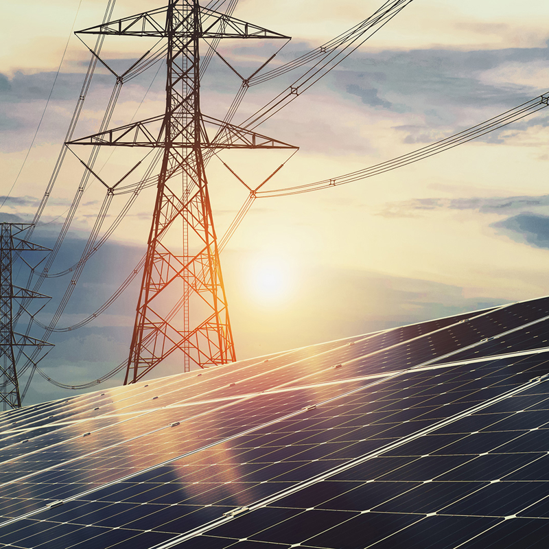 Electricity transmission towers and solar panel array