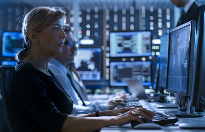 Workers accessing defence data systems using computers