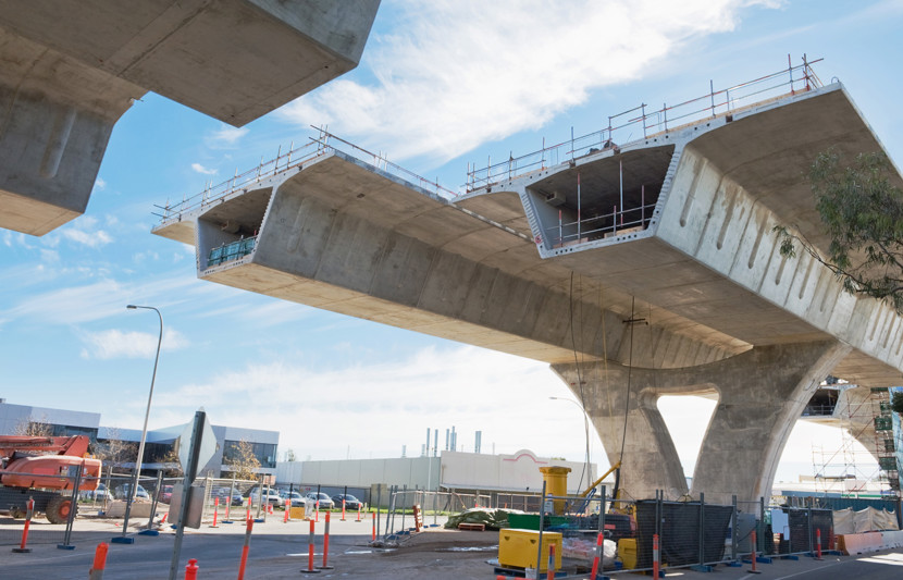 Bridge overpass construction project Australia. Two road decks with a gap between.