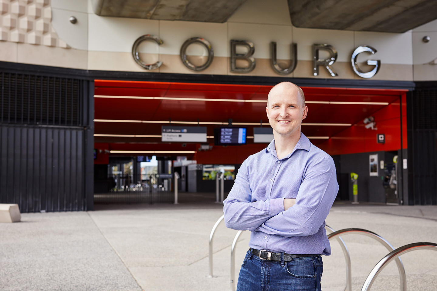 Michael Liddicoat, RPS Communications and Engagement consultant stands outside of the new Coburg Train Station in Melbourne.
