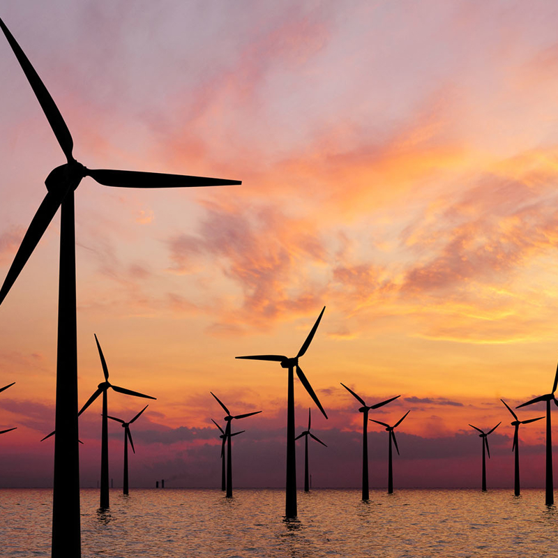 offshore wind farm at sunset