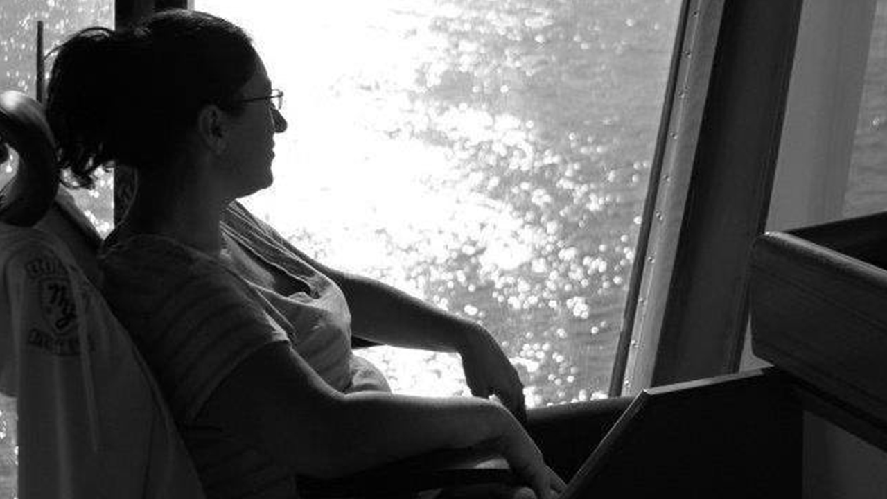 Sara Davis, a Protected Species Observer with RPS, on board ship