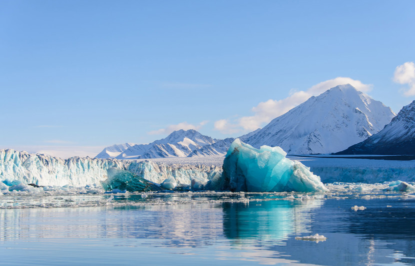 Image of a big blue piece of ice in Arctic sea