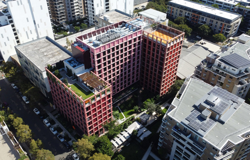 Iglu student accommodation aerial view of rooftops gardens and lush landscapes