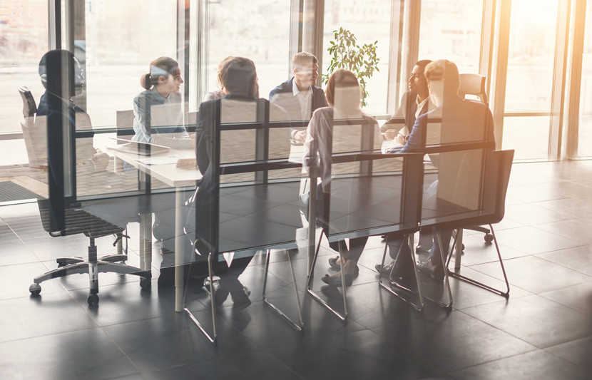 Deal Advisory Team Discussing M&A Due Diligence