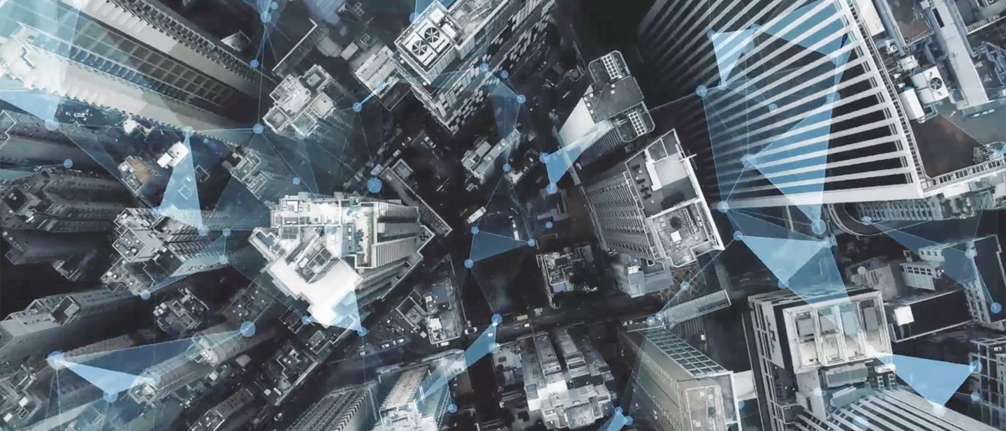 Aerial city image with prisms overlaid